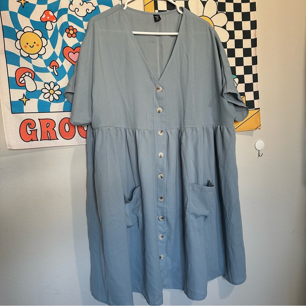 Flowy blue button up dress with pockets